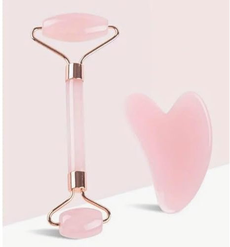 Rouleau de massage visage Gua sha et pierre pour améliorer l'aspect de la peau, anti-âge. Effet lifting pour lutter contre les effets du vieillissement sur le visage et le cou. Réduit les rides. Rose