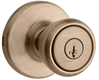 Kwikset Tylo 94002-854 - Pomo de puerta de entrada con llave con protección antimicrobiana Microban con seguridad SmartKey en latón antiguo