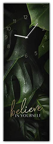 STYLER Wanduhr Believe - lautlose Uhr aus Glas Made in EU - Glasuhr inklusive Wandaufhängung - Wanduhr ohne Tickgeräusche mit Metallzeiger - Natur Monstera Pflanze Grün Schwarz Spruch - 20 x 60 cm