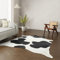 Wildlife Design Kuhfell Teppich Echtfell Schwarz Weiß XL 230x210 cm Wohnzimmer Nachhaltig Tierfreundlich Gratis Lederuntersetzer