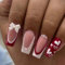 GlamRays Lot de 24 faux ongles de taille moyenne, en forme de cœur, avec breloques, motifs rouge-blanc, French manucure